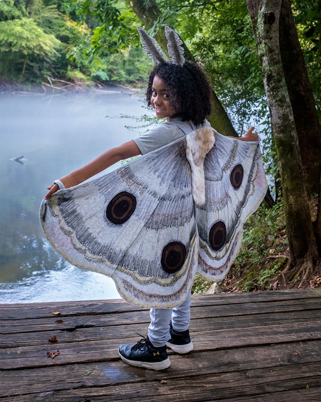 Moth: One child wearing a gray outfit, with handmade moth wings and antennas.