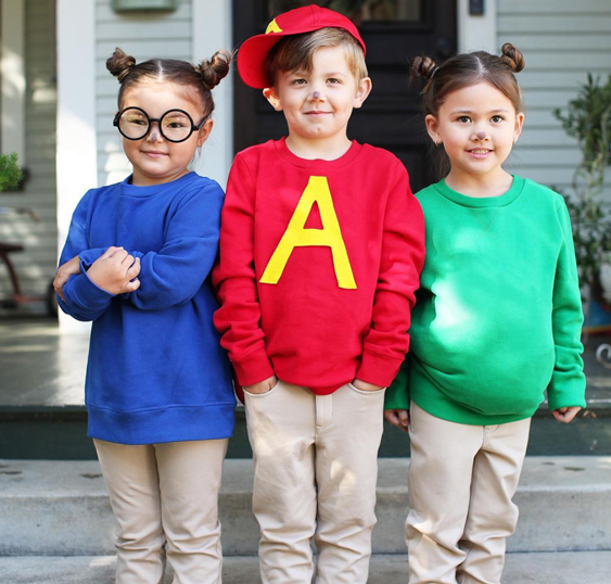 Alvin and the Chipmunks (Kid): Three children all wearing tan bottoms, and one wearing a red long sleeve top and hat with A's on them; one wearing a long sleeve blue top and glasses; and a third wearing a green top. 