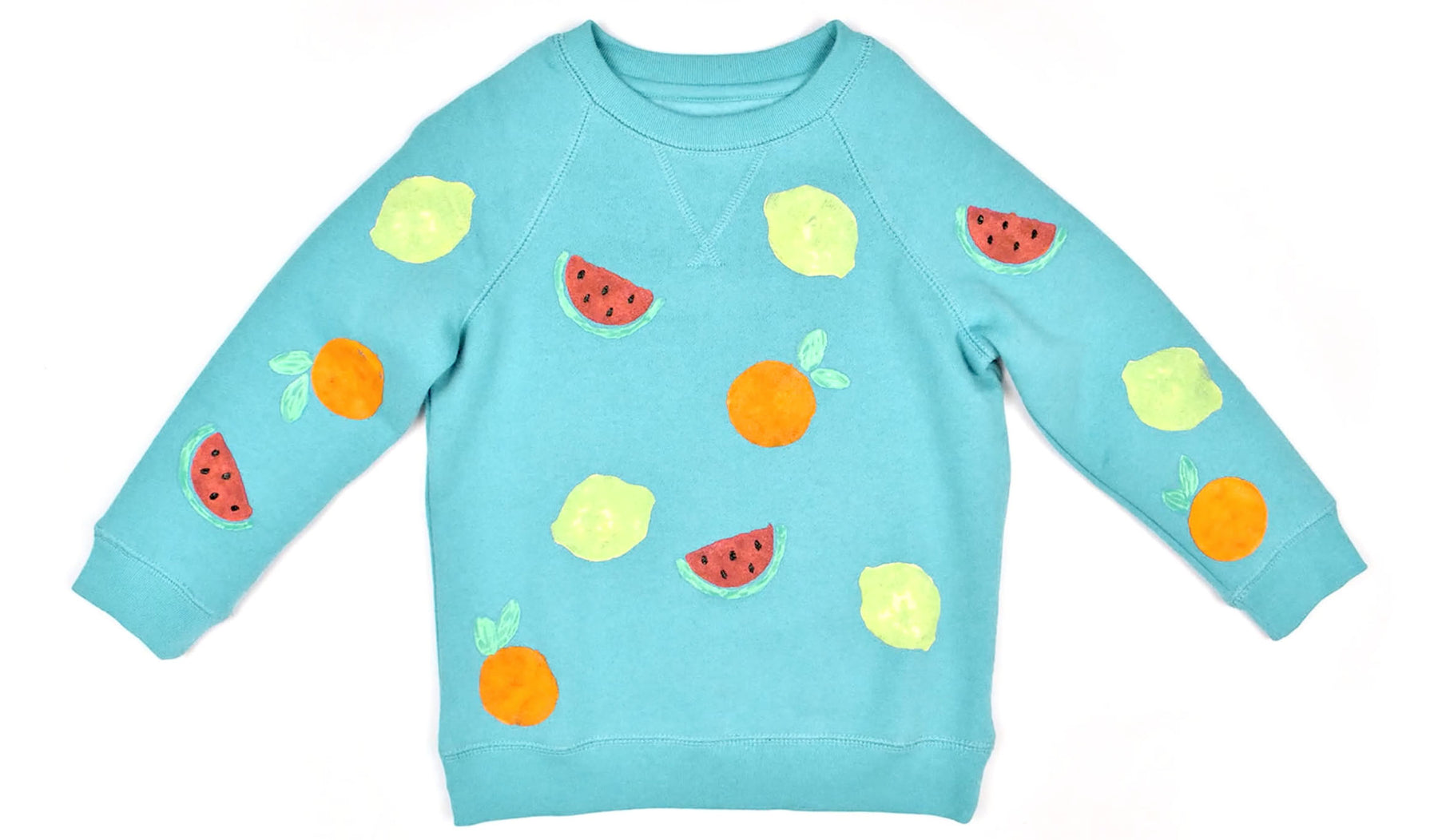 blue sweatshirt with DIY painted fruit shapes 