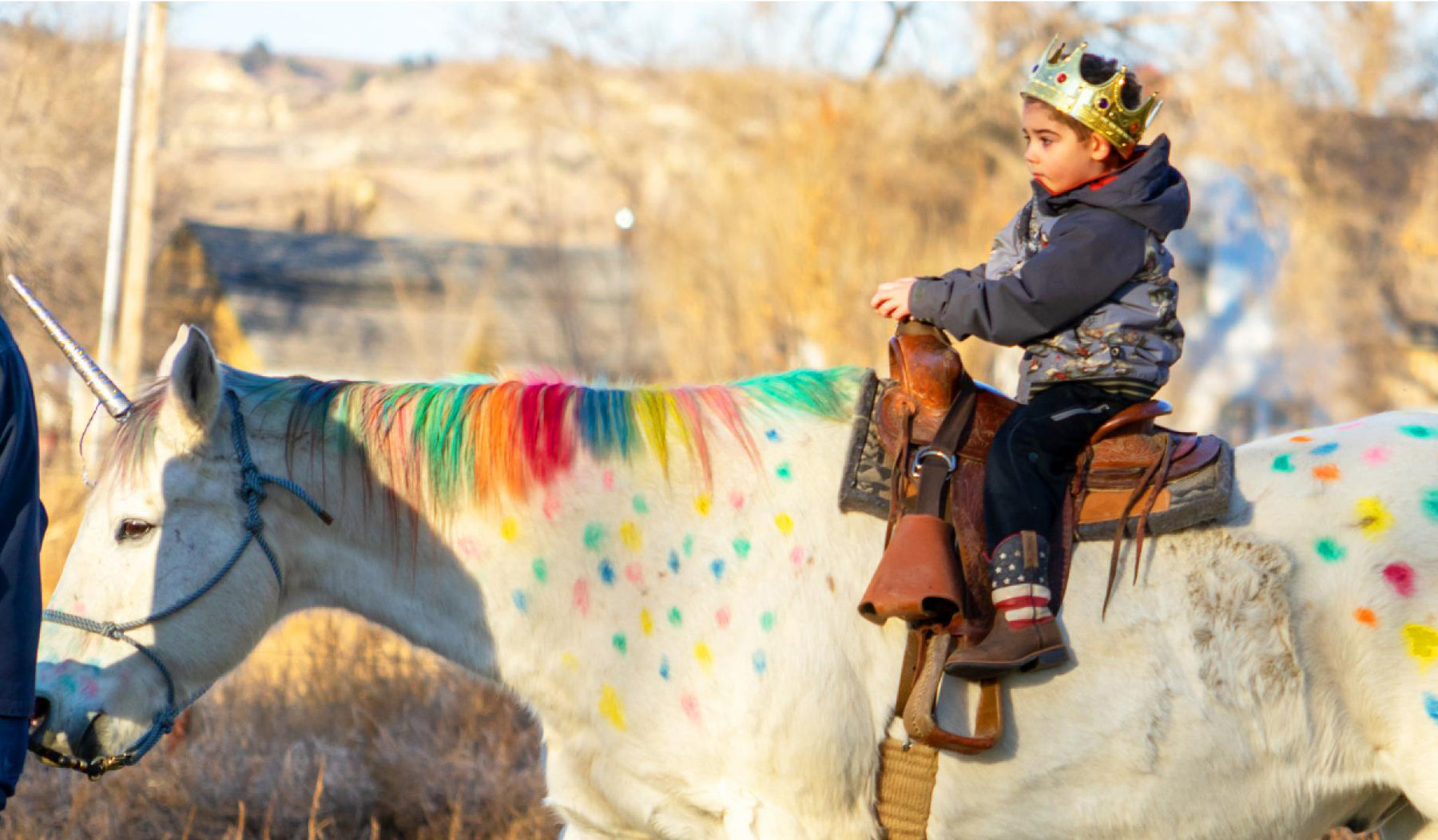 Boy riding unicorn