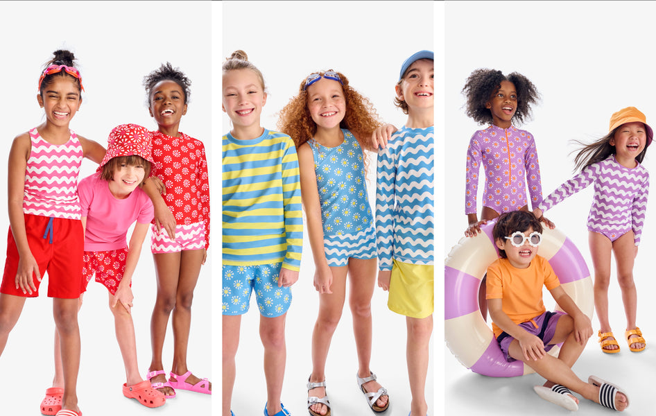9 kids standing in a row wearing our new mix-and-match UPF 50+ swimwear