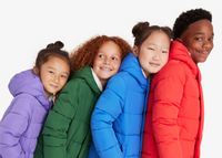 4 kids standing and hugging each other wearing our parka puffer jacket in 4 different colors. 