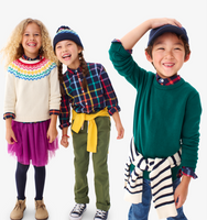 A group of kids wearing our clothing from our holiday outfit line. Corduroy dress, rainbow plaid button downs, sweaters, and chinos. 